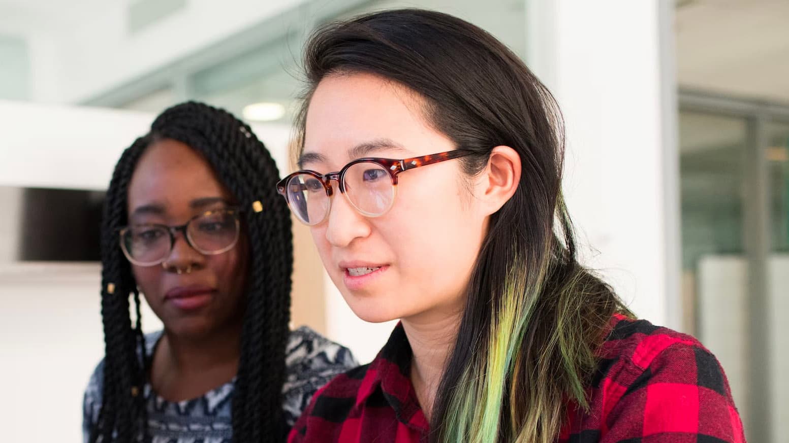 Tony Montana at work with a colleague